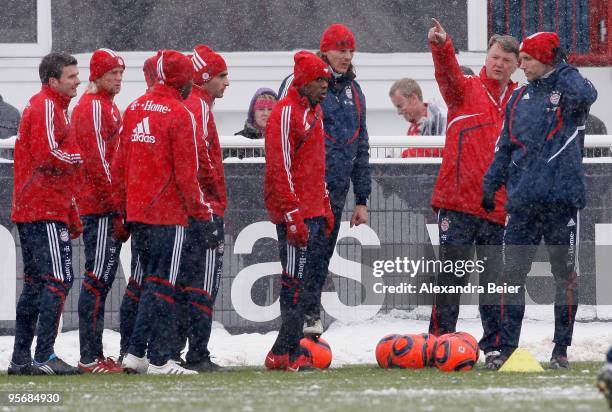 Team coach Louis van Gaal of FC Bayern Muenchen gestures as players listen to him during the team's first training session after a training camp in...