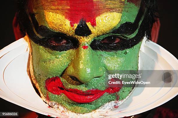 Red Eyes of an Actor of the traditional temple dance drama Kathakali on December 16, 2009 in Varkala near Trivandrum, Kerala, India.The red colour...