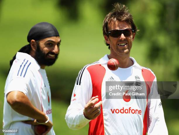 Graeme Swann of England shares a joke with Monty Panesar during an England nets session at The Wanderers Cricket Ground on January 11, 2010 in...