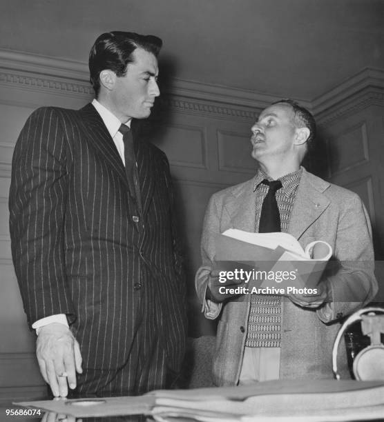 American actor Gregory Peck with producer Darryl F. Zanuck during filming of 'Gentleman's Agreement', directed by Elia Kazan, May 1947.