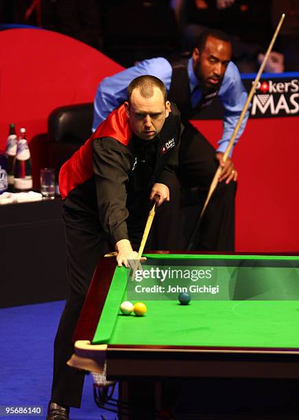 Rory McLeod of England keeps an eye on Mark Williams during the PokerStar.com Masters snooker tournament at Wembley Arena on January 11, 2010 in...