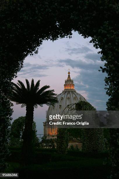 View of St. Peter's Basilica framed by the Vatican Gardens on May 30, 2009 in Vatican City, Vatican. The Vatican Gardens have been a place of quiet...