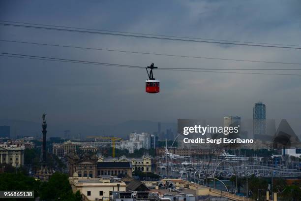 aerial view of barcelona with the cable car in the background - aerial cable stock-fotos und bilder