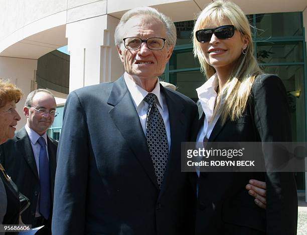 Talk show host Larry King arrives with his wife Shawn King to attend the Bob Hope Memorial Tribute at the Academy of Television Arts & Sciences in...
