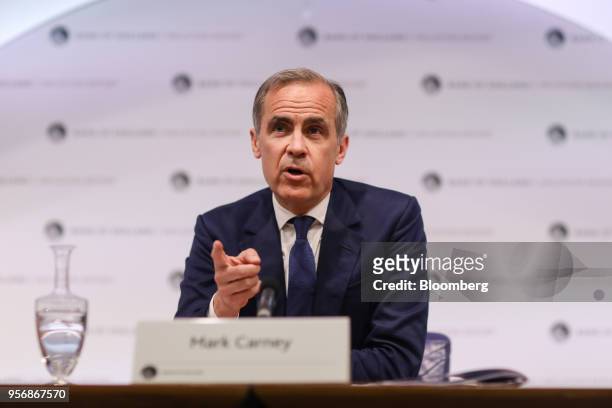 Mark Carney, governor of the Bank of England , gestures while speaking during the bank's quarterly inflation report news conference in the City of...