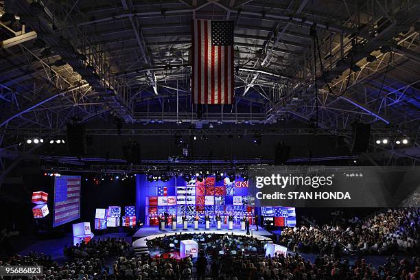 Democratic presidential candidates stand on stage during the CNN/YouTube Democratic Presidential Candidates Debate 23 July 2007 at the Citadel...