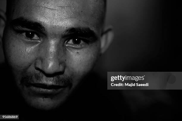 Drug addict looks to camera while on the Wadan detox program at the Kabul Drug Treatment and Rehabilitation Center on January 03, 2010 in Kabul,...