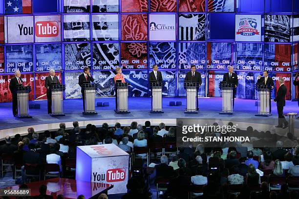 Democratic presidential candiadtes stand at their respective podiums during the CNN/YouTube Democratic Presidential Candidates Debate 23 July 2007 at...