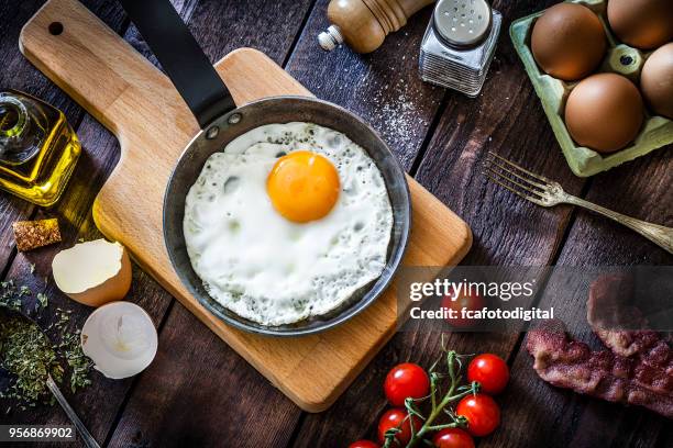 preparing fried egg - protein shaker stock pictures, royalty-free photos & images