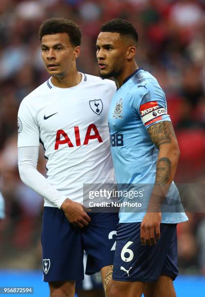Tottenham Hotspur's Dele Alli and Newcastle United's Jamaal Lascelles during the English Premier League match between Tottenham Hotspur and Newcastle...
