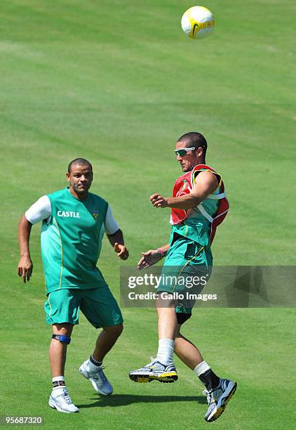 Wayne Parnell wins a header against Ashwell Prince during a training session at the Bidvest Wanderers Stadium on January 11, 2010 in Johannesburg,...