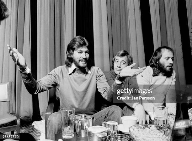 The Bee Gees posed at a Press Conference in Copenhagen, Denmark in 1975. L-R Barry Gibb, Robin Gibb, Maurice Gibb