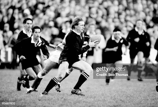 As part of the New Zealand All Blacks Rugby Union Tour of Great Britain, Stu Wilson of New Zealand is pictured in action during the South of Scotland...