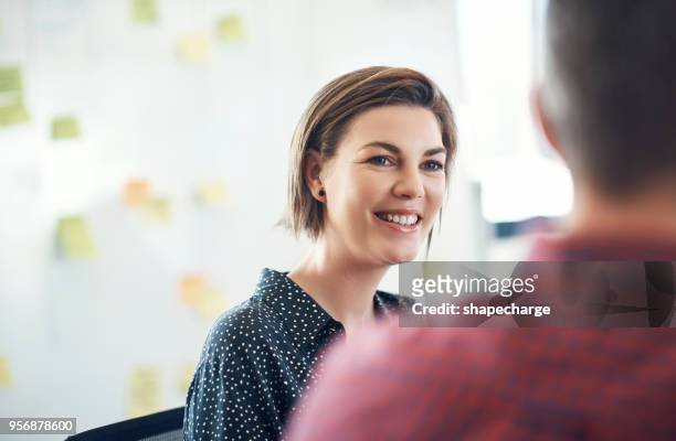nothing makes her smile like a productive meeting - casual clothing stock pictures, royalty-free photos & images