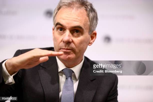 Ben Broadbent, deputy governor for monetary policy at the Bank of England , gestures while speaking during the bank's quarterly inflation report news...