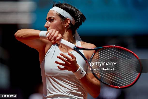 Caroline Garcia of France in action her match against Carla Suarez Navarro of Spain during day six of the Mutua Madrid Open tennis tournament at the...