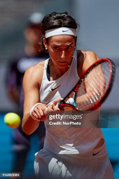 Caroline Garcia of France in action her match against Carla Suarez Navarro of Spain during day six of the Mutua Madrid Open tennis tournament at the...