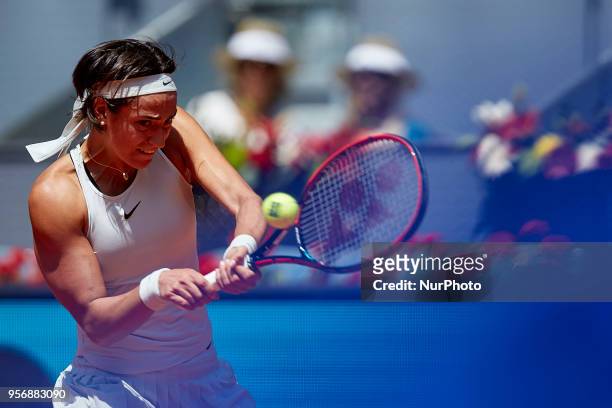 Caroline Garcia of France in action her match against Carla Suarez Navarro of Spain during day six of the Mutua Madrid Open tennis tournament at the...