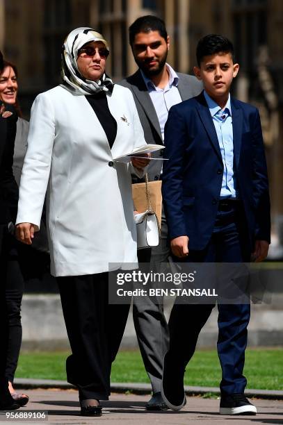 Fatima Boudchar , wife of former Islamist fighter turned politician Abdel Hakim Belhaj, her son Abderrahim Belhaj and members of her legal team and...