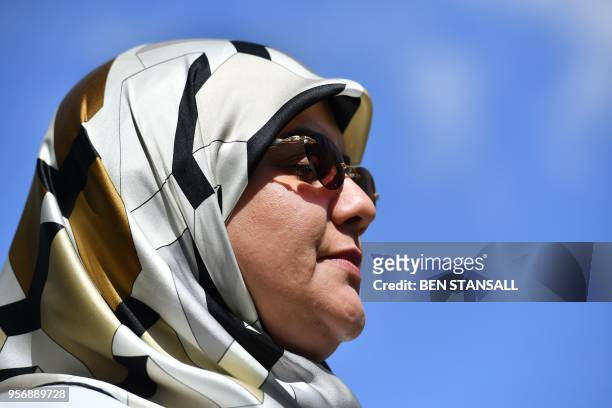Fatima Boudchar, wife of former Islamist fighter turned politician Abdel Hakim Belhaj, attends a media conference on College Green outside the Houses...