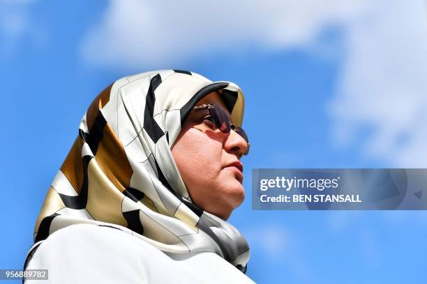 Fatima Boudchar, wife of former Islamist fighter turned politician Abdel Hakim Belhaj, attends a media conference on College Green outside the Houses...