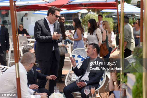 Editorial Director Matthew Belloni and Simon Kinberg at the '355' cocktail party, with DIRECTV and The Hollywood Reporter on the Grey Goose Terrace...