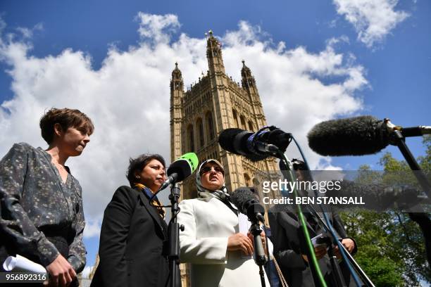 Fatima Boudchar , wife of former Islamist fighter turned politician Abdel Hakim Belhaj, delivers a statement during a media conference on College...