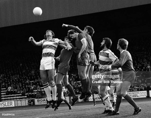 Liverpool goalkeeper Ray Clemence punches the ball away during their First Division league match against Queens Park Rangers at Loftus Road in...