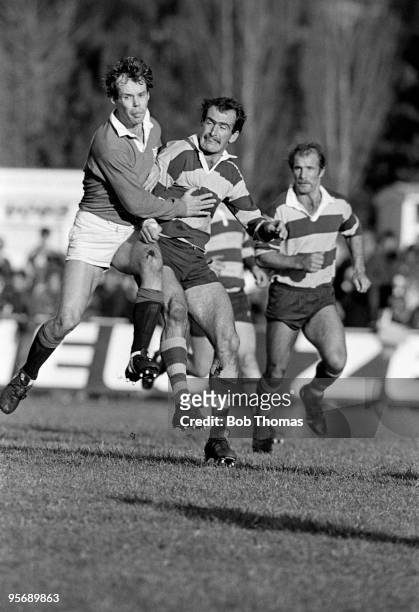 Wing Clive Woodward of the British Lions clashes with Bay of the Plenty's John Cameron at the Rotorua International Stadium during their Rugby Tour...