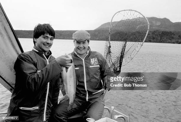 Lions' wing Peter Baird and his Scottish teammate Colin Deans with one of the rainbow trout they caught on a fishing trip near Rotorua during the...