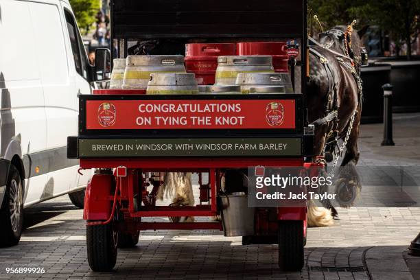 Barrels of Windsor Knot, a beer to commemorate the upcoming Royal Wedding, are carted by horse ahead of the wedding of Prince Harry and his fiance US...