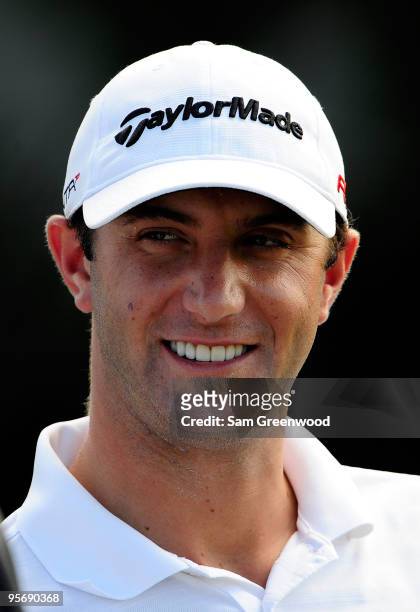 Dustin Johnson smiles on the first hole during the second round of the SBS Championship at the Plantation course on January 8, 2010 in Kapalua, Maui,...