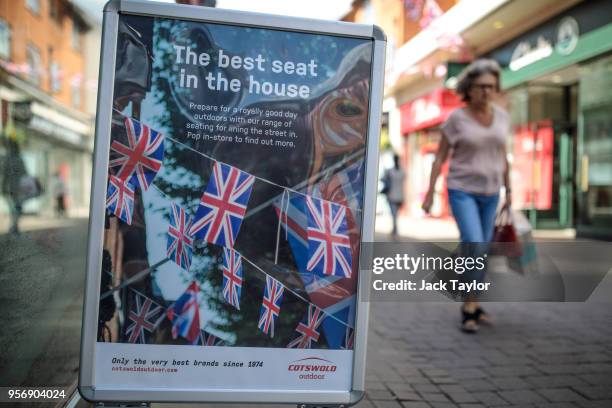 An sign advertising fold-up chairs to view the Royal Wedding procession sits outside a camping shop ahead of the wedding of Prince Harry and his...