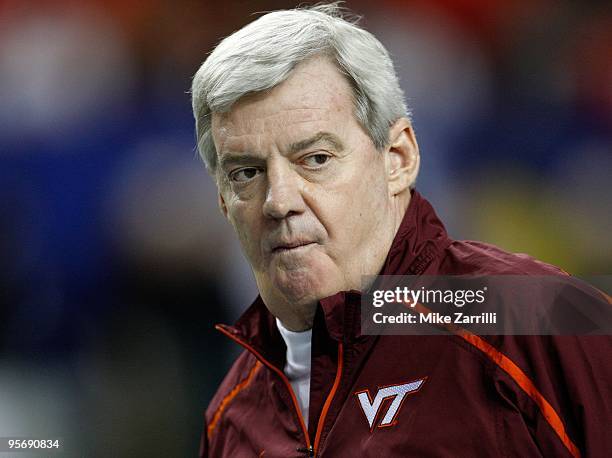 Virginia Tech Hokies head coach Frank Beamer watches warmups on the field before the Chick-Fil-A Bowl against the Tennessee Volunteers at the Georgia...