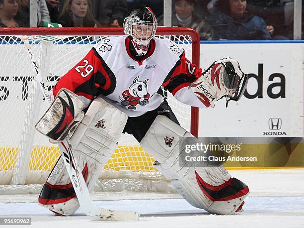 Mark Visentin of the Niagara Ice Dogs watches for an incoming shot in a game against the London Knights on January 8, 2010 at the John Labatt Centre...