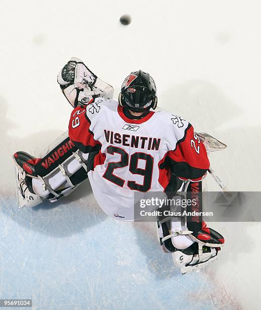 Mark Visentin of the Niagara Ice Dogs stops a shot in the warm-up prior to a game against the London Knights on January 8, 2010 at the John Labatt...