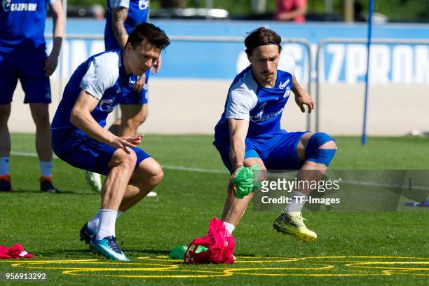 Yevhen Konoplyanka of Schalke and Benjamin Stambouli of Schalke in action during a training session at the FC Schalke 04 Training center on May 8,...