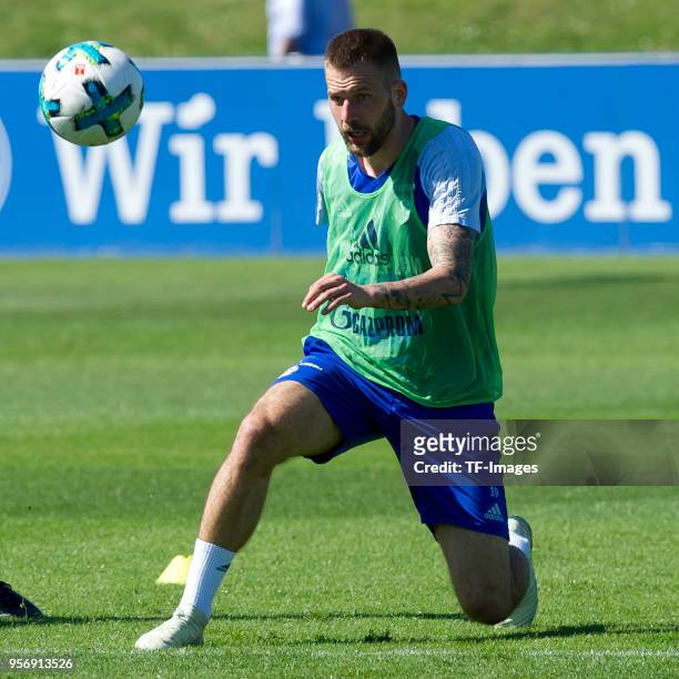 Guido Burgstaller of Schalke controls the ball during a training session at the FC Schalke 04 Training center on May 8, 2018 in Gelsenkirchen,...