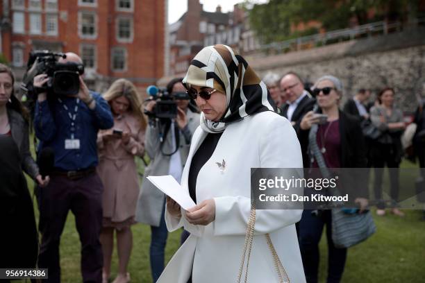 The wife of former Islamist fighter turned politician Abdel Hakim Belhaj, Fatima Boudchar, leaves after speaking to the press on College Green...