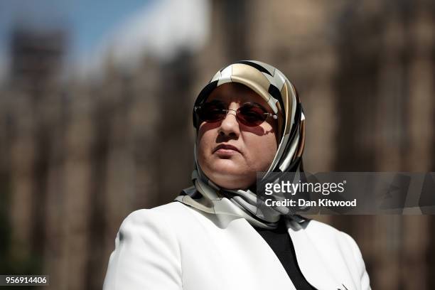 The wife of former Islamist fighter turned politician Abdel Hakim Belhaj, Fatima Boudchar, speaks to the press on College Green outside the Houses of...