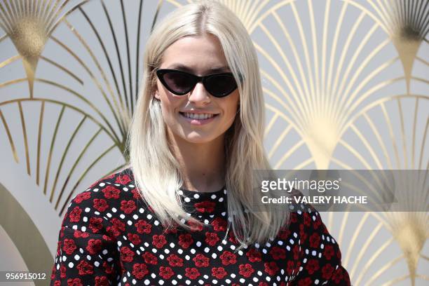 German model Lena Gercke attends on May 10, 2018 a promotional event on a private beach at the 71st edition of the Cannes Film Festival in Cannes,...