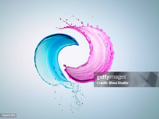 pink and blue splash water - balance concept stock pictures, royalty-free photos & images