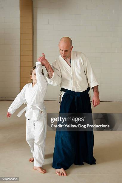 children's aikido martial arts class - vechtsport stockfoto's en -beelden