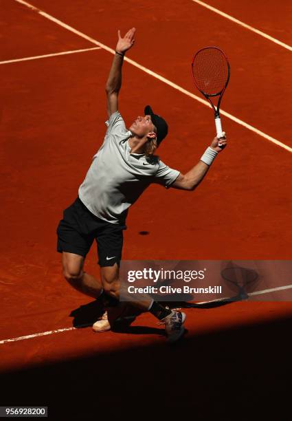 Denis Shapovalov of Canada serves against Milos Raonic of Canada in their third round match during day six of the Mutua Madrid Open tennis tournament...