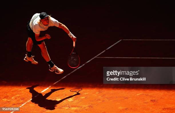 Denis Shapovalov of Canada serves against Milos Raonic of Canada in their third round match during day six of the Mutua Madrid Open tennis tournament...