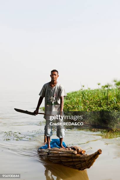 Fishermen at Lake Tana. Ethiopia. The fishermen of Lake Tana are still using the traditional canoe like boats made from papyrus. These boats are...