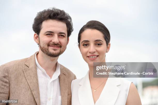 Shawky and Dina Emam attend the "Yomeddine" Photocall during the 71st annual Cannes Film Festival at Palais des Festivals on May 10, 2018 in Cannes,...