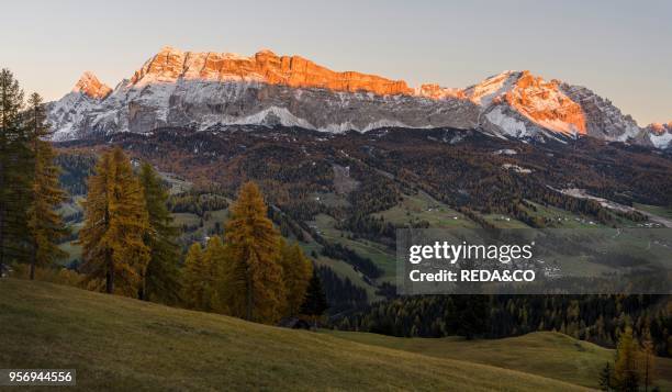 Mount Heiligkreuzkofel - Sasso di Santa Croce in Fanes mountain range in South Tyrol - Alto Adige. Village Abtei - BAdia in the valley. The Dolomites...