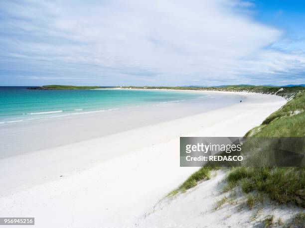 Landscape on the island of North Uist in the Outer Hebrides. Sandy beach with dunes near Solas. Europe. Scotland. June.