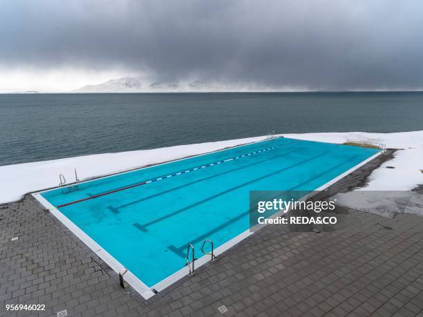 Hofsos. A traditional fishing village with many historic buildings on the coast of Skagafjoerdur during winter. The municipal swimming pool. Europe....